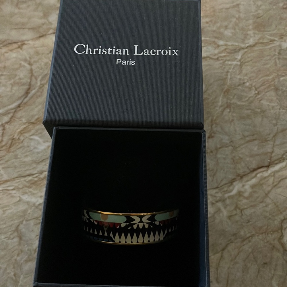 Bought in Paris at his boutique.  Original box included.